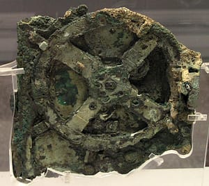 An ancient bronze mechanism with intricate gears and inscriptions.